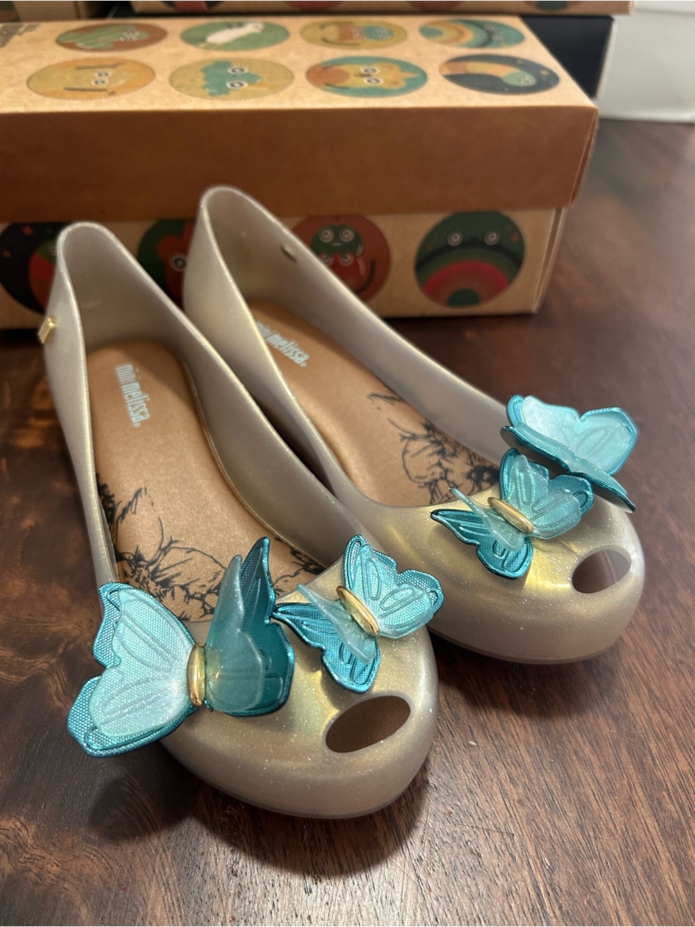 Mini Melissa Pearl Cream Jelly Flats with Turquoise Butterfly Accents
